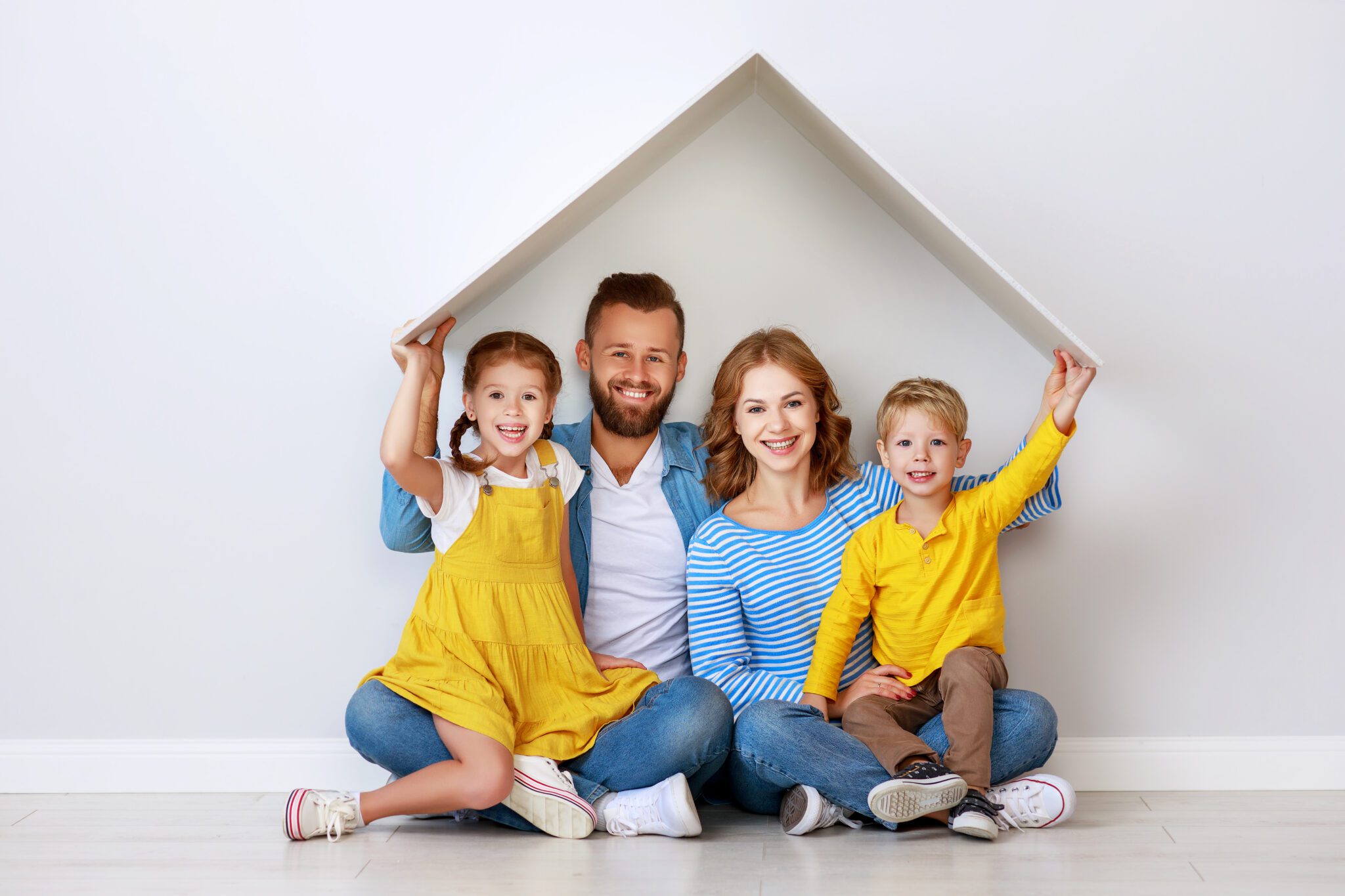 concept housing a young family. mother father and children in a new home